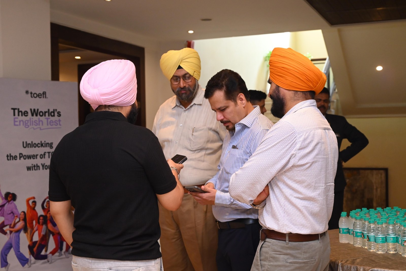 TOEFL guests interacting beside the activation branding