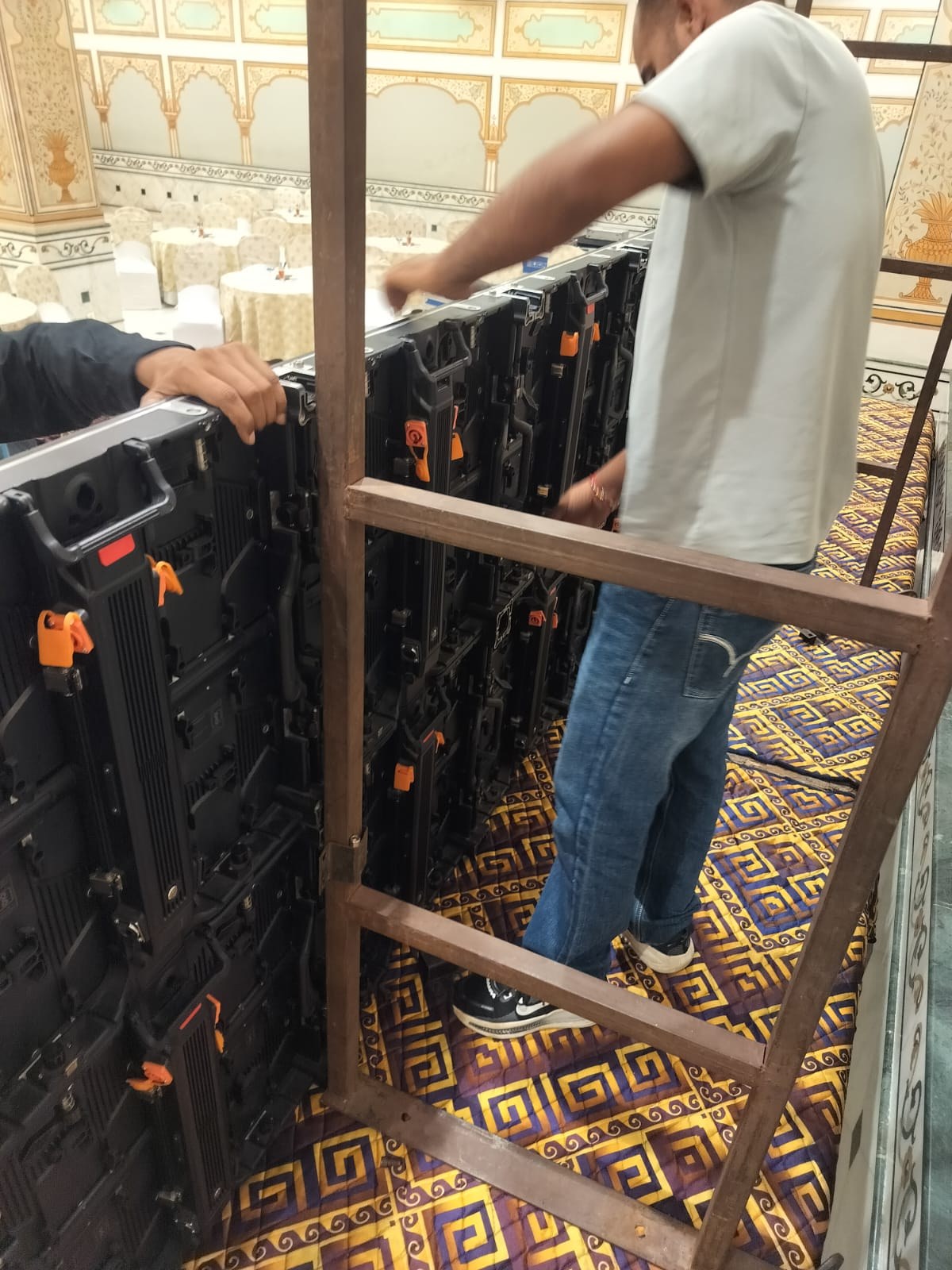 Technician assembling the back of the LED panels